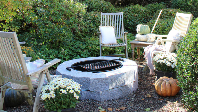 How a Granite Fire Pit Completed the Look of a New England Family’s Nantucket Style Backyard Retreat